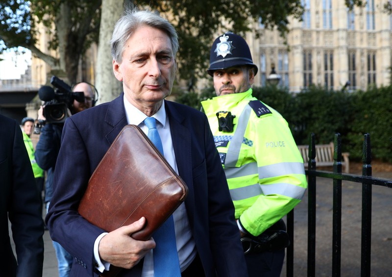 Britain's Conservative MP Philip Hammond leaves the Houses of Parliament after parliament discussed Brexit, sitting on a Saturday for the first time since the 1982 Falklands War, in London