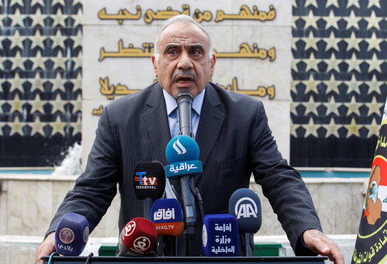 Iraqi Prime Minister Adel Abdul Mahdi speaks during a symbolic funeral ceremony of Major General Ali al-Lami, who commands the Iraqi Federal Police's Fourth Division, who was killed in Salahuddin, in Baghdad