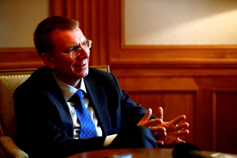 FILE PHOTO: Latvia's Foreign Minister Edgars Rinkevics speaks during an interview in Riga