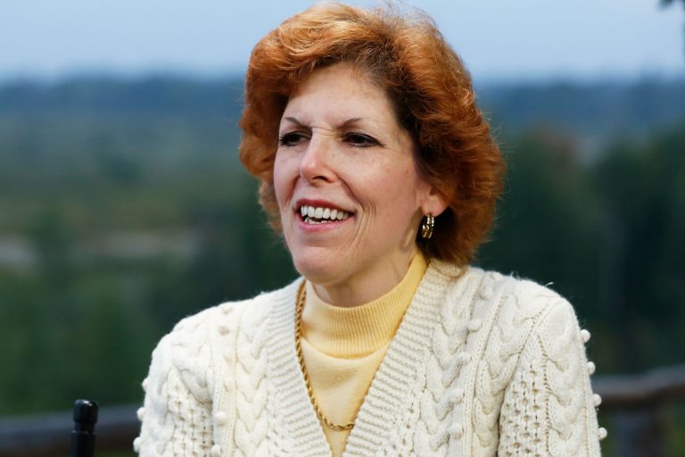 Loretta Mester says consumers are holding up the economy, as trade weighs it down