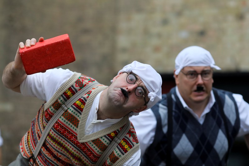 Monty Python fans dressed as the Gumbys gather in an attempt to set the world record for the largest gathering of people dressed as Gumbys as a part of the 50th anniversary of Monty Python's Flying Circus at the Roundhouse in London