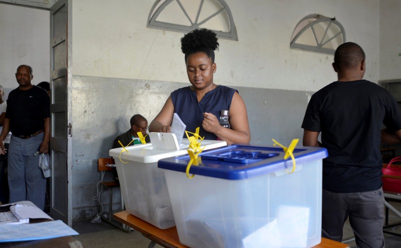 A Women casts her vote during the presidential, legislative and provincial elections in Maputo