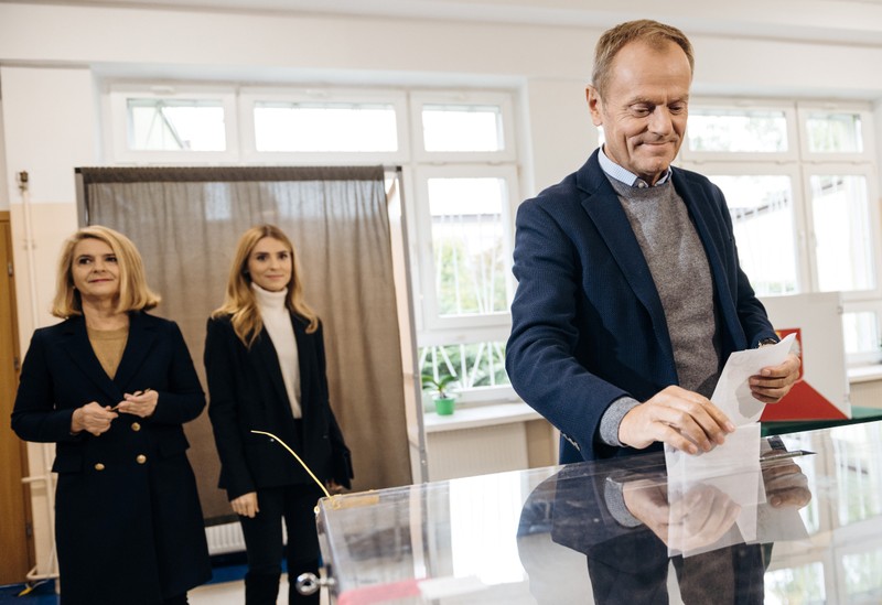 European Council President Donald Tusk casts his vote during parliamentary election in Sopot