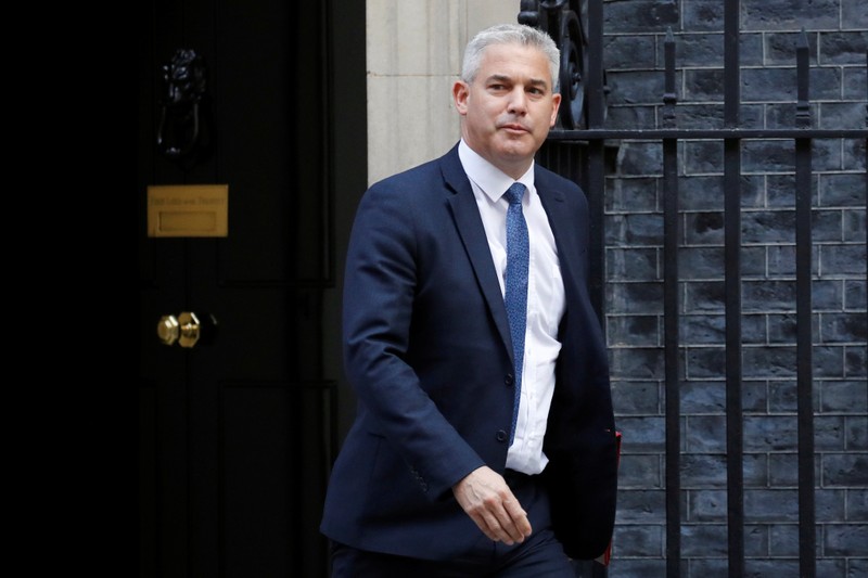 Britain's Brexit Secretary Barclay walks outside 10 Downing Street in London