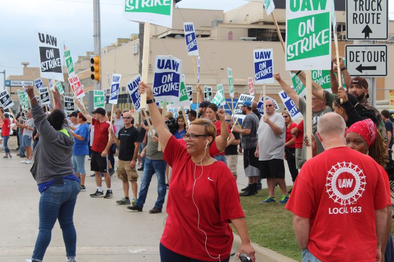 Pressure mounts on GM and United Auto Workers to make a deal as strike drags into 19th day