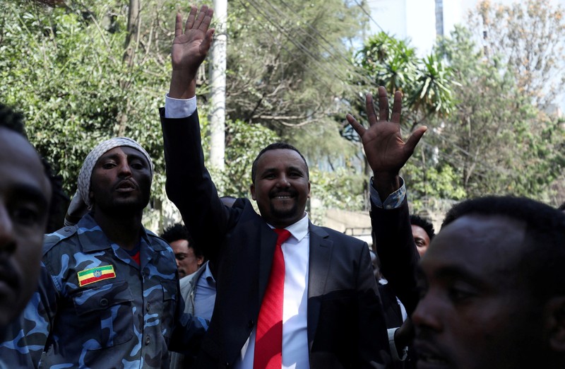 FILE PHOTO: Jawar Mohammed, an Oromo activist, waves to supporters outside his house in Addis Ababa