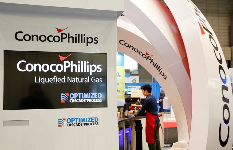 FILE PHOTO: Logos of ConocoPhillips are seen in its booth at Gastech, the world's biggest expo for the gas industry, in Chiba
