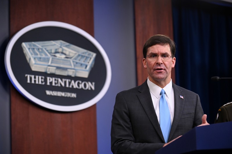 U.S. Defense Secretary Esper addresses reporters at the Pentagon in Arlington