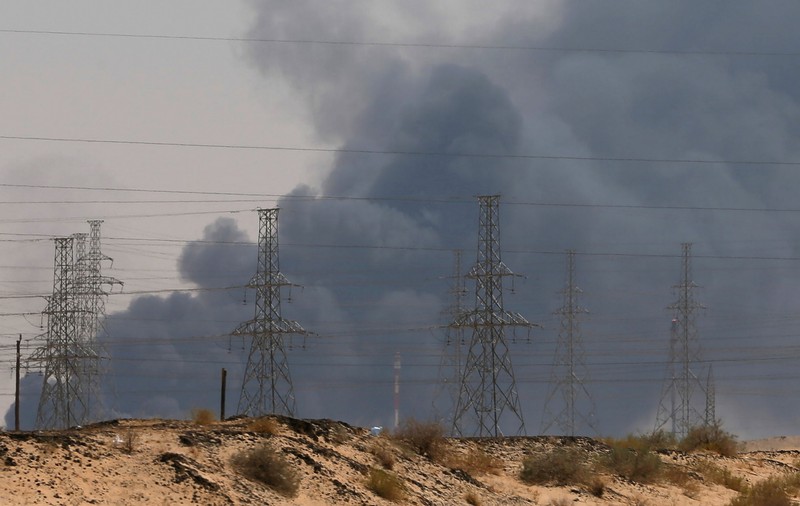 FILE PHOTO: Smoke is seen following a fire at an Aramco factory in Abqaiq