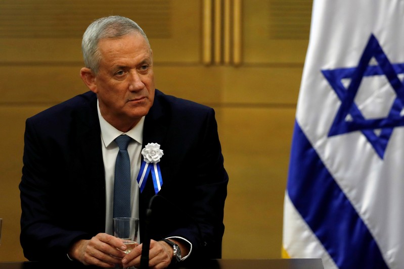 FILE PHOTO: Benny Gantz, leader of Blue and White party looks on during a meeting of his party faction at the Knesset, Israel's parliament, in Jerusalem