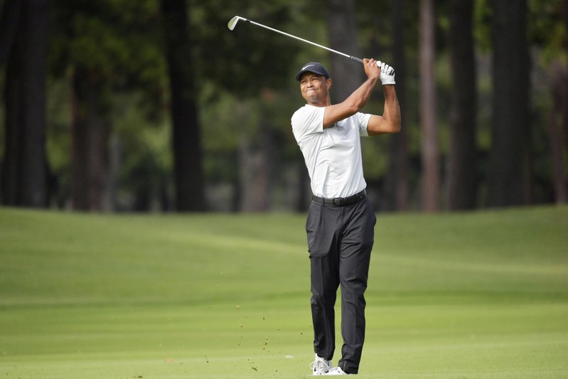 Tiger Woods shoots on the 9th hole during the second round of the Zozo Championship, a PGA Tour event, at Narashino Country Club in Inzai, Japan