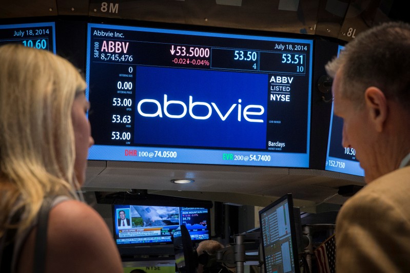 FILE PHOTO: A screen displays the share price for drugmaker AbbVie on the floor of the New York Stock Exchange