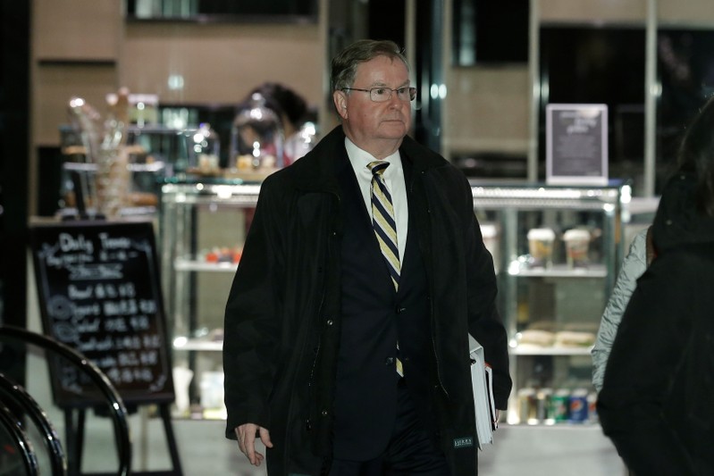 U.S. trade delegation member Steven Winberg arrives at a hotel after talks with Chinese officials in Beijing
