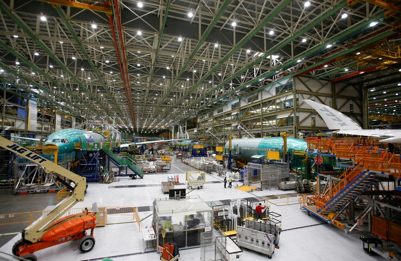 Several Boeing 777X aircraft are seen in various stages of production during a media tour of the Boeing 777X at the Boeing production facility in Everett,