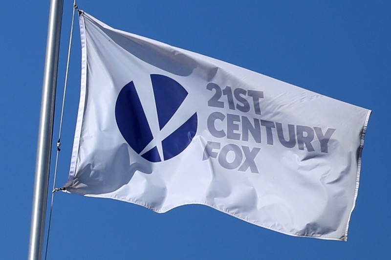 The Twenty-First Century Fox Studios flag flies over the company building in Los Angeles