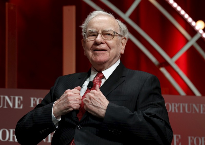 FILE PHOTO: Buffett, chairman and CEO of Berkshire Hathaway, takes his seat to speak at the Fortune's Most Powerful Women's Summit in Washington