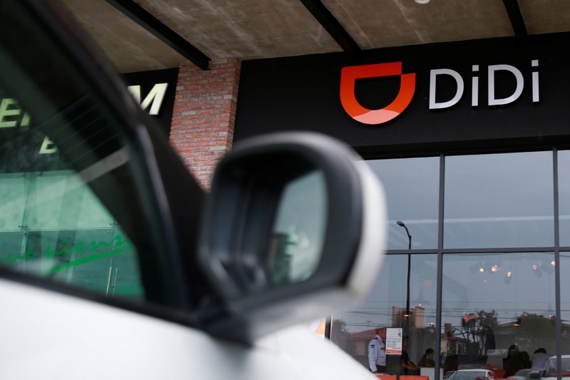 The logo of Chinese ride-hailing firm Didi Chuxing is seen at their new drivers center in Toluca