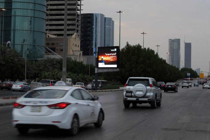 A billboard display an advert for Saudi Aramco in the streets in Riyadh