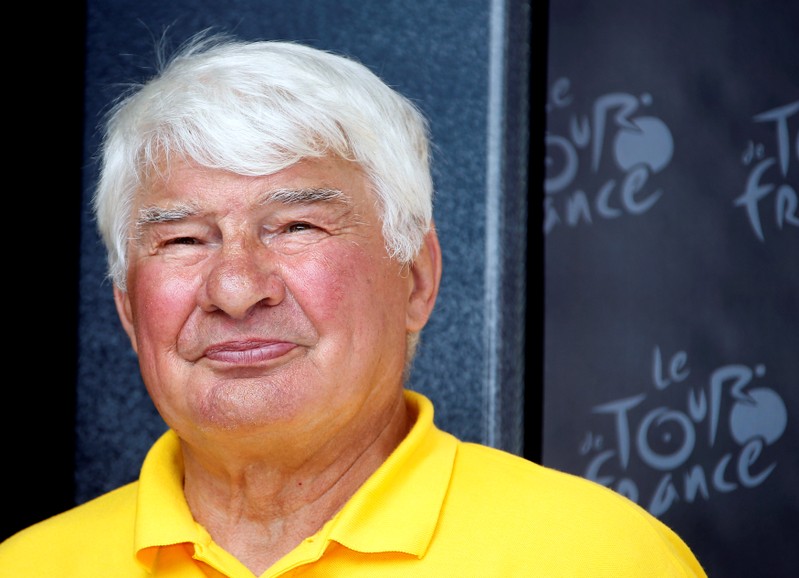 FILE PHOTO: Former French cyclist Raymond Poulidor is seen on the podium of the 168.5 km ninth stage of the centenary Tour de France cycling race from Saint-Girons to Bagneres-de-Bigorre