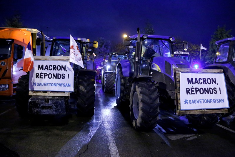 French farmers drive on the A1 Lille-Paris motorway during a protest near Vemars