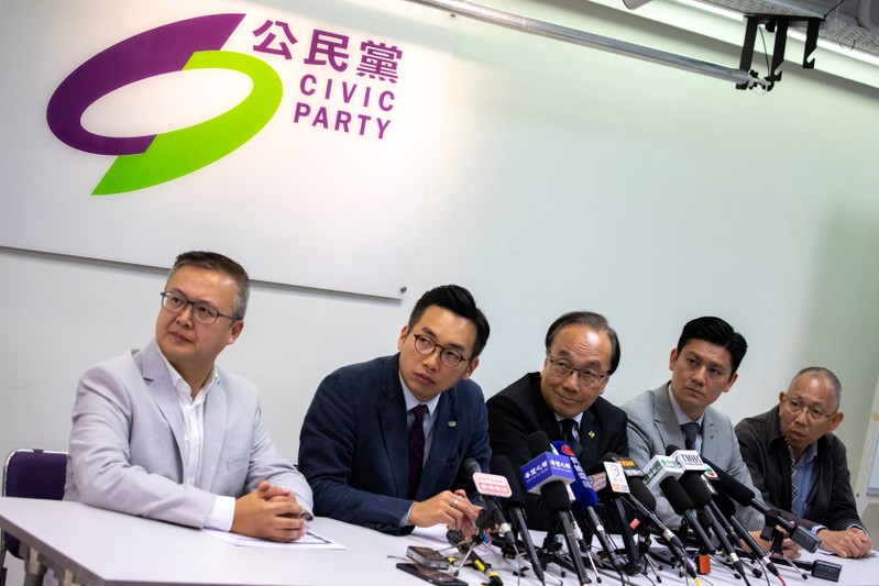 Leaders of the Civic Party attend at a news conference after the local district council election in Hong Kong