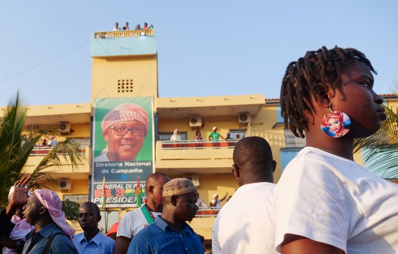 Supporters of presidential candidate Umaro Sissoko Embalo gather outside his campaign headquarters in Bissau