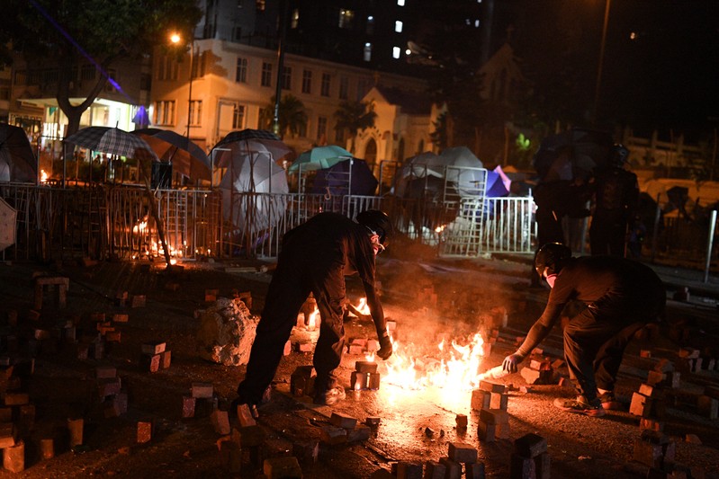 Protesters clash with police at the Polytechnic University of Hong Kong in Hong Kong