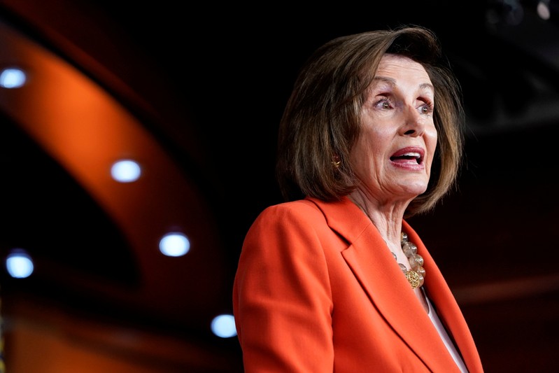 FILE PHOTO: Speaker of the House Nancy Pelosi (D-CA) speaks ahead of a House vote authorizing an impeachment inquiry into U.S. President Trump in Washington
