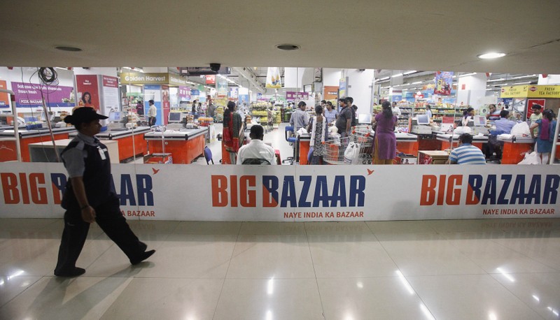 A security personnel walks past the Big Bazaar retail store in Mumbai