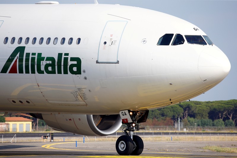 FILE PHOTO: An Alitalia airplane is seen before take off from the Leonardo da Vinci-Fiumicino Airport in Rome, Italy