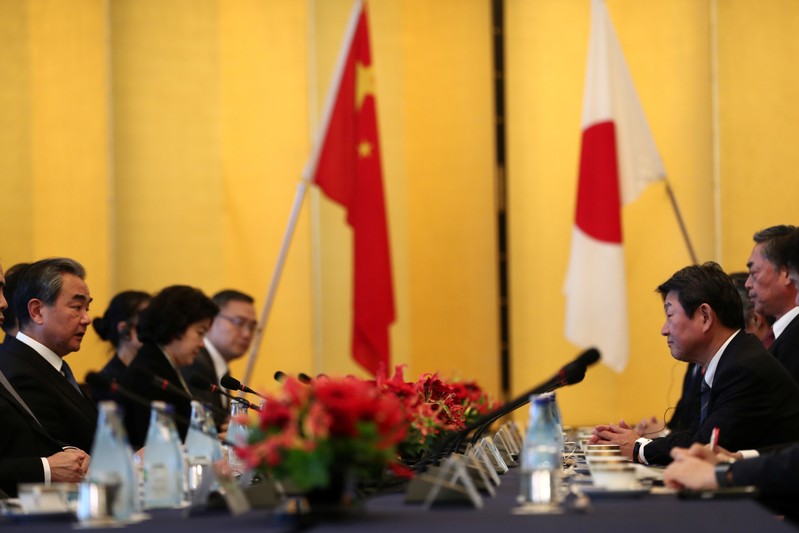 Japan’s Foreign Minister Motegi and his Chinese counterpart Wang Yi attend a meeting in Tokyo