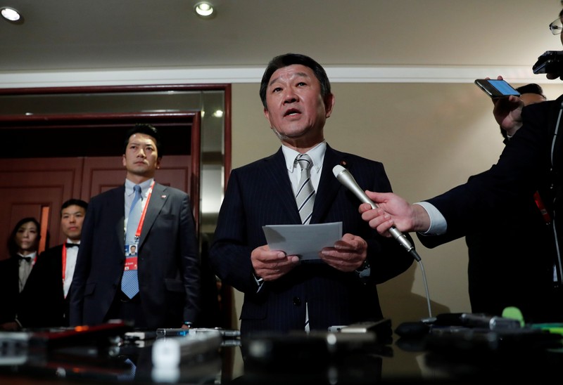 Japanese Foreign Minister Toshimitsu Motegi gestures after talking to reporters about GSOMIA pact with South Korea during G20 Foreign Ministers meeting in Nagoya