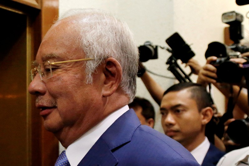 FILE PHOTO: Former Malaysian Prime Minister Najib Razak arrives at Kuala Lumpur High Court in Kuala Lumpur
