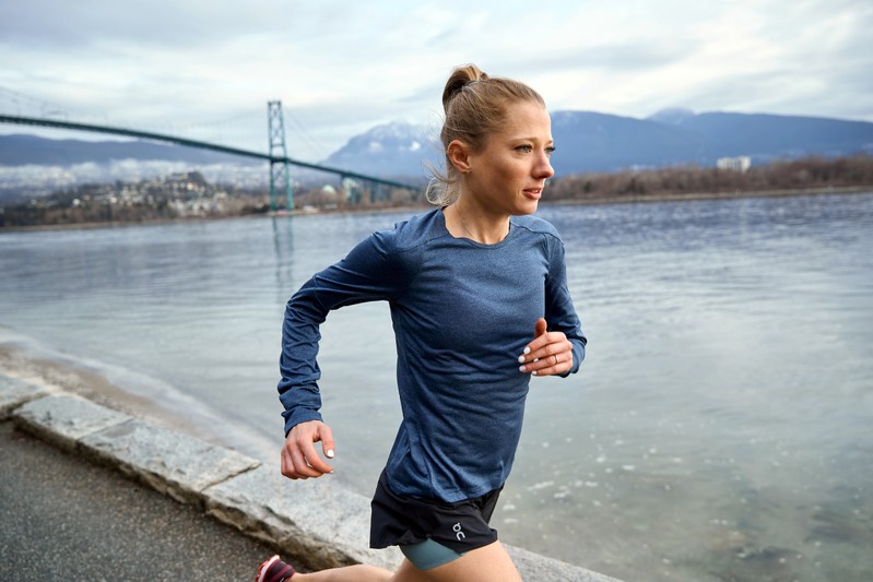 Canadian marathon runner Rachel Cliff runs by the Stanley Park seawall in Vancouver