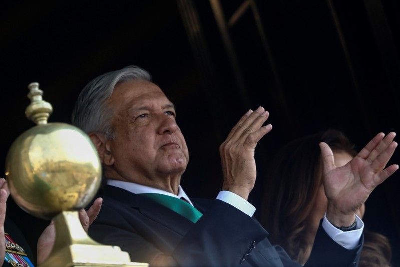Mexico's President Andres Manuel Lopez Obrador takes part in a military parade in celebration of the 109th anniversary of the Mexican Revolution in Mexico City