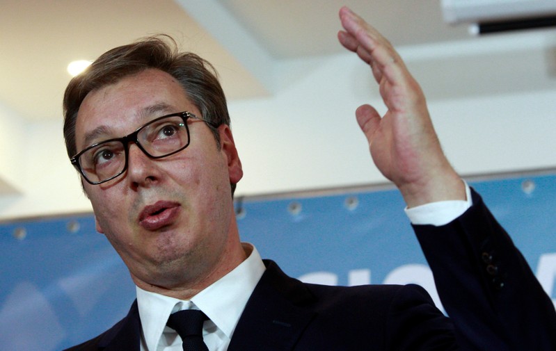 FILE PHOTO: Serbia's President Aleksandar Vucic talks at a news conference during trilateral meeting in Ohrid