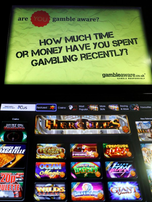 FILE PHOTO: A fixed odds betting terminals is seen in a betting shop in London