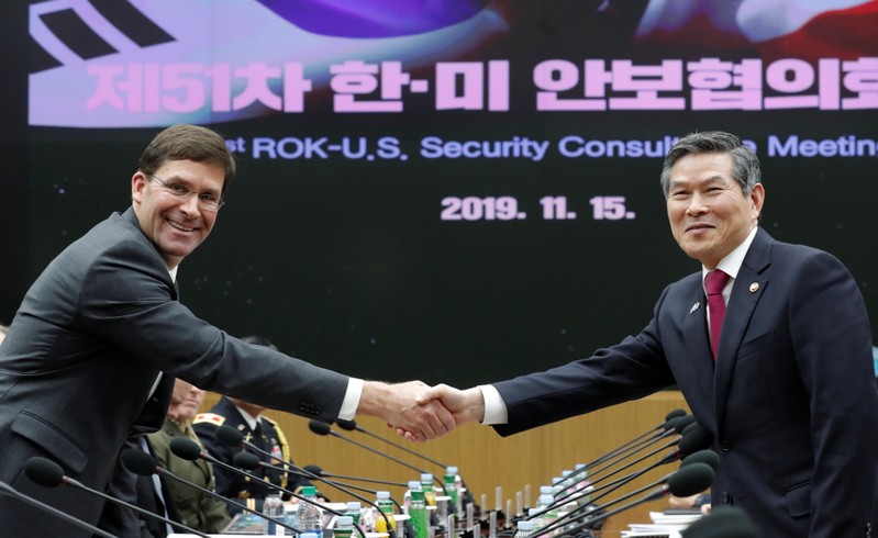 U.S. Defense Secretary Esper and South Korean Defense Minister Jeong shake hands for the media prior to the 51st SCM in Seoul