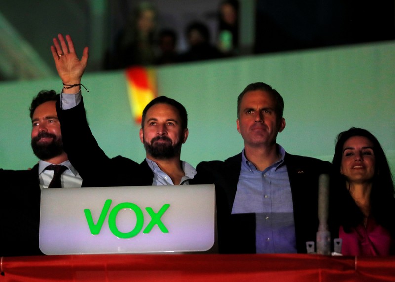 FILE PHOTO: Spain's far-right party Vox candidate Santiago Abascal reacts during Spain's general election at the party headquarters in Madrid
