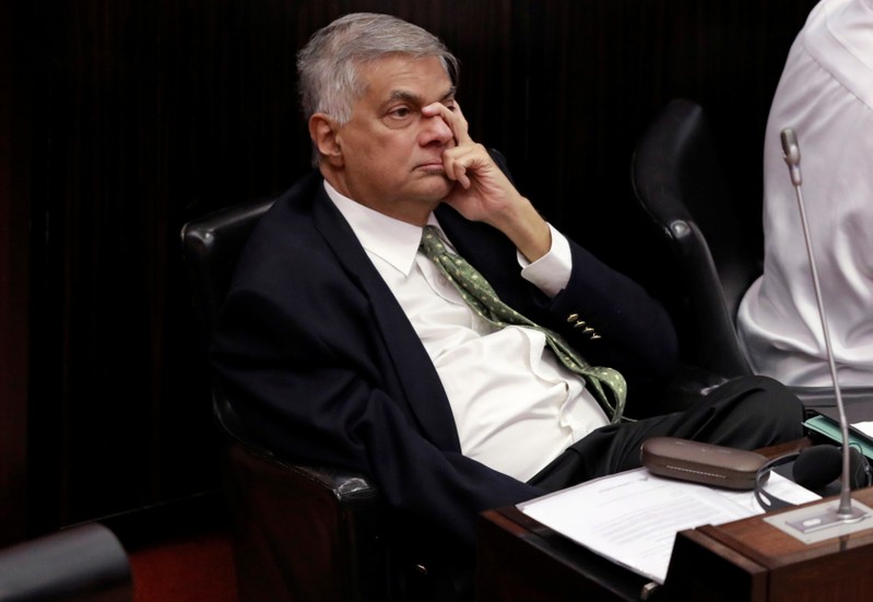 Sri Lanka's ousted PM Wickremesinghe looks on during a parliament session in Colombo
