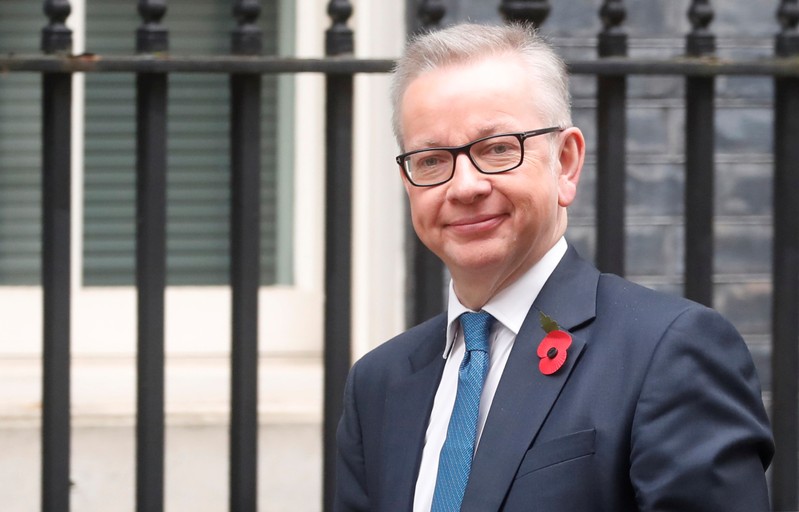 FILE PHOTO: Chancellor of the Duchy of Lancaster Michael Gove is seen outside Downing Street in London