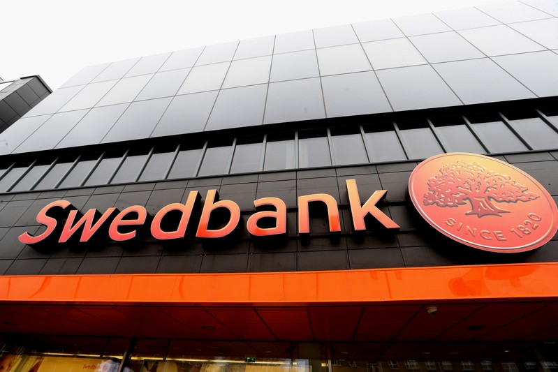 FILE PHOTO: Swedbank sign is seen on the local headquarters building in Tallinn