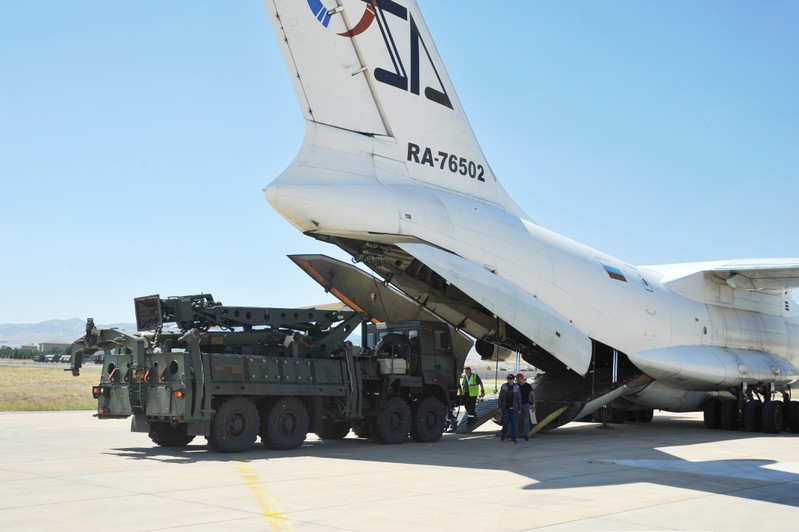 FILE PHOTO: Parts of a Russian S-400 defense system are unloaded from a Russian plane at Murted Airport near Ankara