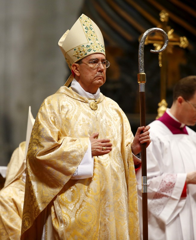 FILE PHOTO: Newly ordained bishop Ayuso Guixot from Spain stands on the altar during an ordination ceremony in Saint Peter's Basilica at the Vatican