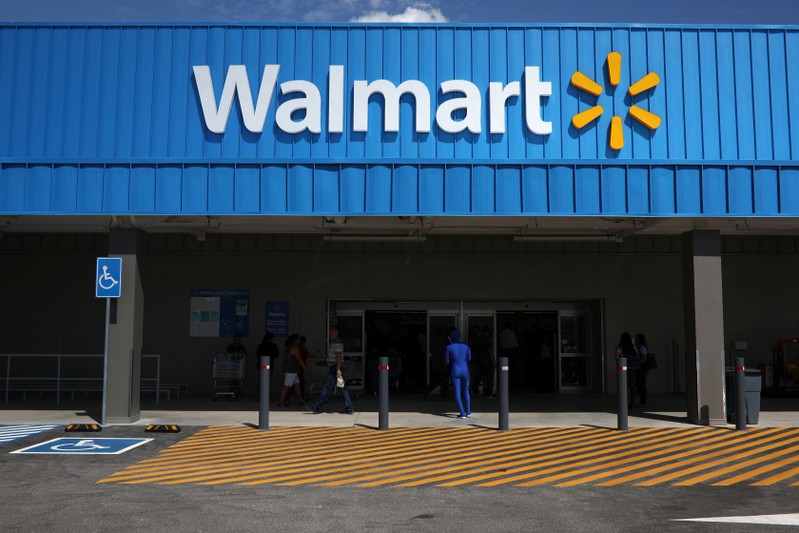 The logo of Walmart is seen outside of a new Walmart Store in San Salvador