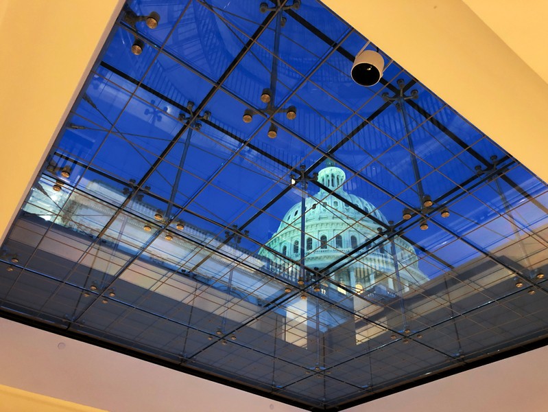 The spiral staircase down to House Intelligence Committee rooms can be seen reflected over the Capitol Dome ahead of Trump impeachment inquiry testimony before a House Intelligence Committee hearing on Capitol Hill in Washington