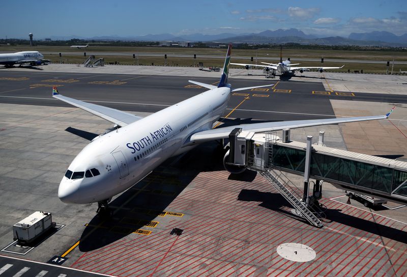 FILE PHOTO: A South African Airways (SAA) aircraft is seen parked on the tarmac at Cape Town International Airport in Cape Town