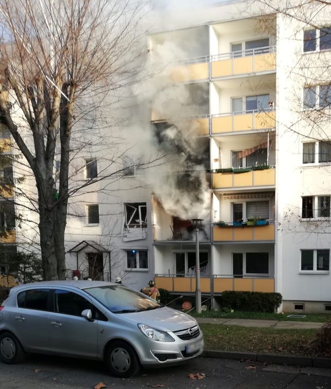 Smoke billows out of an apartment building after an explosion in Blankenburg