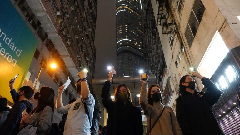 Hong Kong protesters stage New Year marches as authorities cancel midnight fireworks