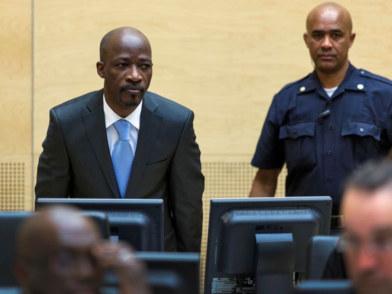 FILE PHOTO: Charles Ble Goude of Ivory Coast enters the courtroom of the International Criminal Court in The Hague